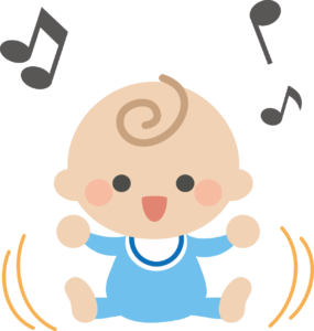 赤ちゃんが音楽を聴いて笑っている